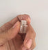 JJKMALL 50Pcs Clear Sample Glass Bottles 1ml with Orifice Reducer, 1pc Gift Storage Bag, 1pc 3ml Dropper