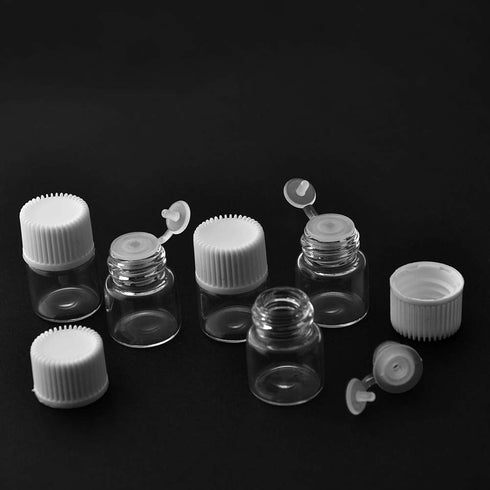 Enslz 50 Pcs Oil Bottles for Essential Oils 1 ml Transparent Glass Vials with Orifice Reducers, White Caps, 2 pcs