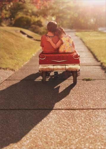 Avanti , Boy & Girl in Toy Car