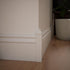 1 1/8"W 6 1/2"H 1 1/8"P 5 1/4"H 1 1/8"P, x x Americraft Solid Paint Grade Wood Universal Baseboard Outside Corner Block