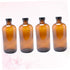 Set 4 of Refillable Boston Round Glass Bottles for Essential Oils