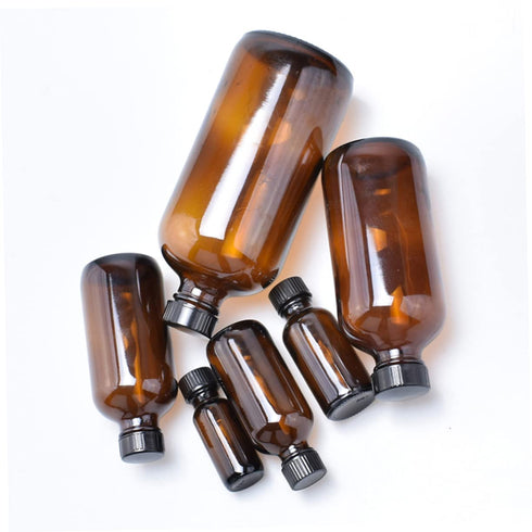 Set 4 of Refillable Amber Glass Boston Round Bottles for Mouthwash and Syrup