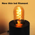 Vintage LED Spiral Filament Bulb T14, E26 LED Bulb 4W Equivalent E26 Bulb 40 Watt Warm White 2200K E26 Edison Bulb dimmable AC120V 400LM,Decorative Antique Filament Light Bulbs,Amber Glass,Pack of 4 by Leools