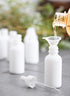 JUVITUS 1 oz Opal White Glass Boston Round Bottle with White Dropper, 24 Pack + Funnel