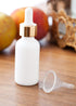 JUVITUS 1 oz Opal White Glass Boston Round Bottle with Gold Metal Dropper, 12 Pack + Funnel