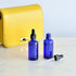 Youngever 12 Pack 2 Ounce Blue Glass Dropper Bottles for Essential Oil, Includes 2 Stainless Steel Mini Funnels