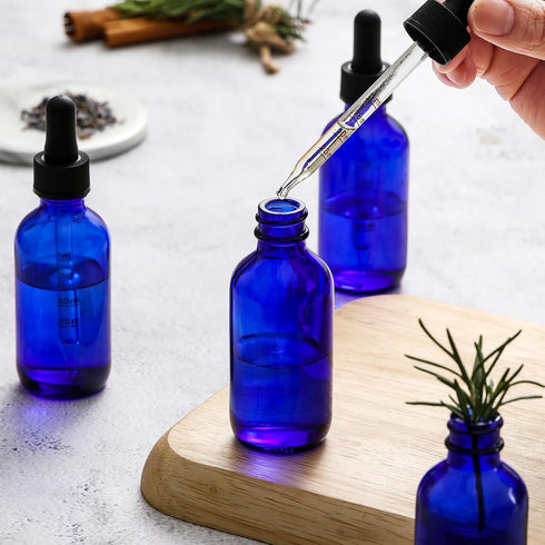 4 Pack 2 oz Dark Blue Glass Dropper Bottles with Measured Dropper - 60ml Leakproof Tincture Bottles