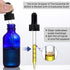 4 Pack 2 oz Glass Dropper Bottles with Measured Dropper - 60ml Dark Blue Tincture Bottles with Graduated Calibrated Glass Eye Droppers (1ml) for Essential Oils, Liquids - Leakproof Travel Bottles by AOZITA