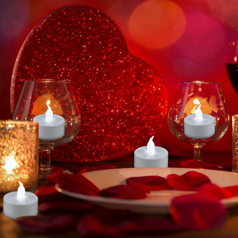 YIWER 50pcs Flameless Tea Lights Candles, Realistic LED Flickering Pumpkin Tea Lights, Long Lasting Electric Fake