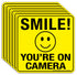 Smile You're On Camera Sign Stickers, 6 Pack - 6 x 6 Inches - Laminated for Ultimate UV, Weather, Scratch Resistance