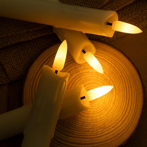 WYZworks 6.75" LED Flameless Mini Taper Candles with Flicker Mode, Battery Operated, 12-Pack, Ivory