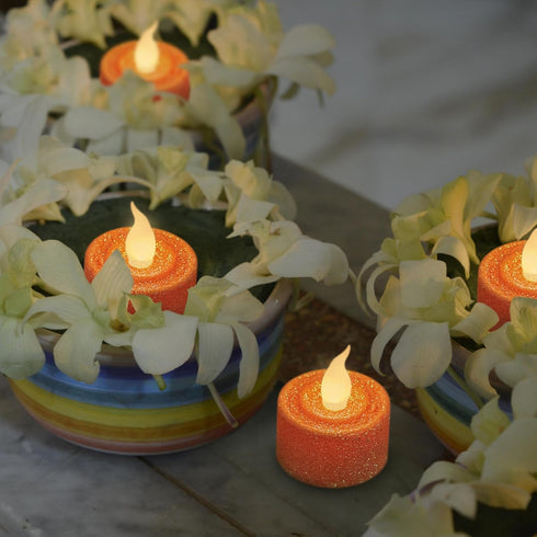 Pack 12, 1.5(W) 1.65(H), FURORA LIGHTING Orange Glitter LED Tealight Candles of Flameless Flickering Tealight Candles