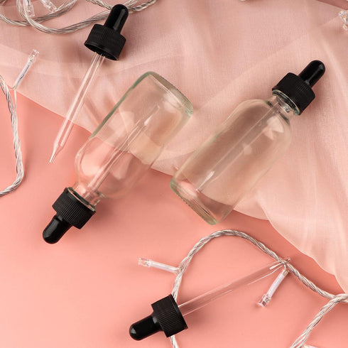 24 Pack 2oz Clear Glass Bottles with Eye Droppers for Essential Oils, Perfumes & Lab Chemicals (Includes Brush,