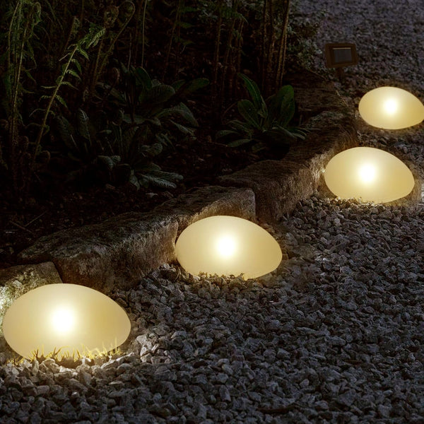 SUNNYPARK Solar Garden Lights Outdoor Set of 4 Plastic Pebble Shape Decorative Rock Lights - Waterproof Warm White
