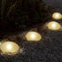 SUNNYPARK Solar Garden Lights Outdoor Set of 4 Plastic Pebble Shape Decorative Rock Lights - Waterproof Warm White