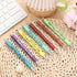 Sherr 7 Pcs Christmas Weekday Pens, Glitter Funny Ballpoint Pens with 10 Black Ink Refills, Rainbow Week Gifts