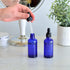 Youngever 12 Pack 2 Ounce Blue Glass Dropper Bottles for Essential Oil, Includes 2 Stainless Steel Mini Funnels