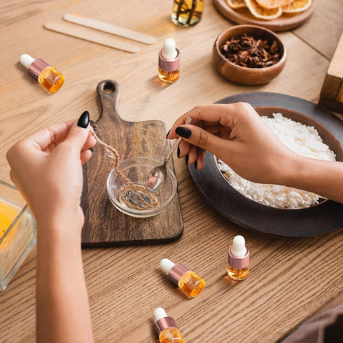 100 Pcs Mini Glass Dropper Bottles, Clear Essential Oil Sample Containers, 1 ml with Cap for Traveling (Rose Gold)