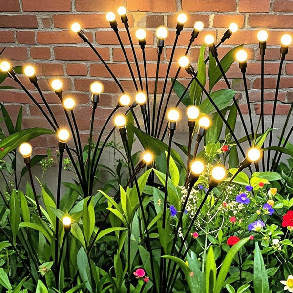 YAKii Solar Garden Lights Outdoor Waterproof, 4 Packs 32LED Firefly Swaying Light,Upgraded